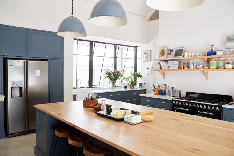 bigstock-Kitchen-island-in-a-large-fami-235570252.jpg